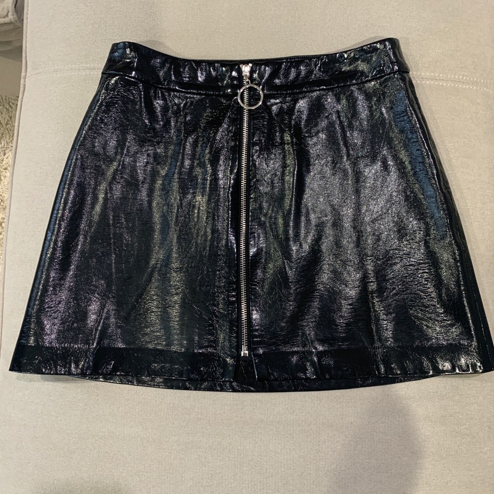 Faux leather black mini skirt. Size small.